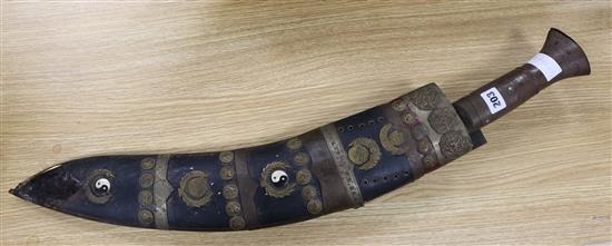 A large Nepalese ceremonial kukri and scabbard length overall 78cm